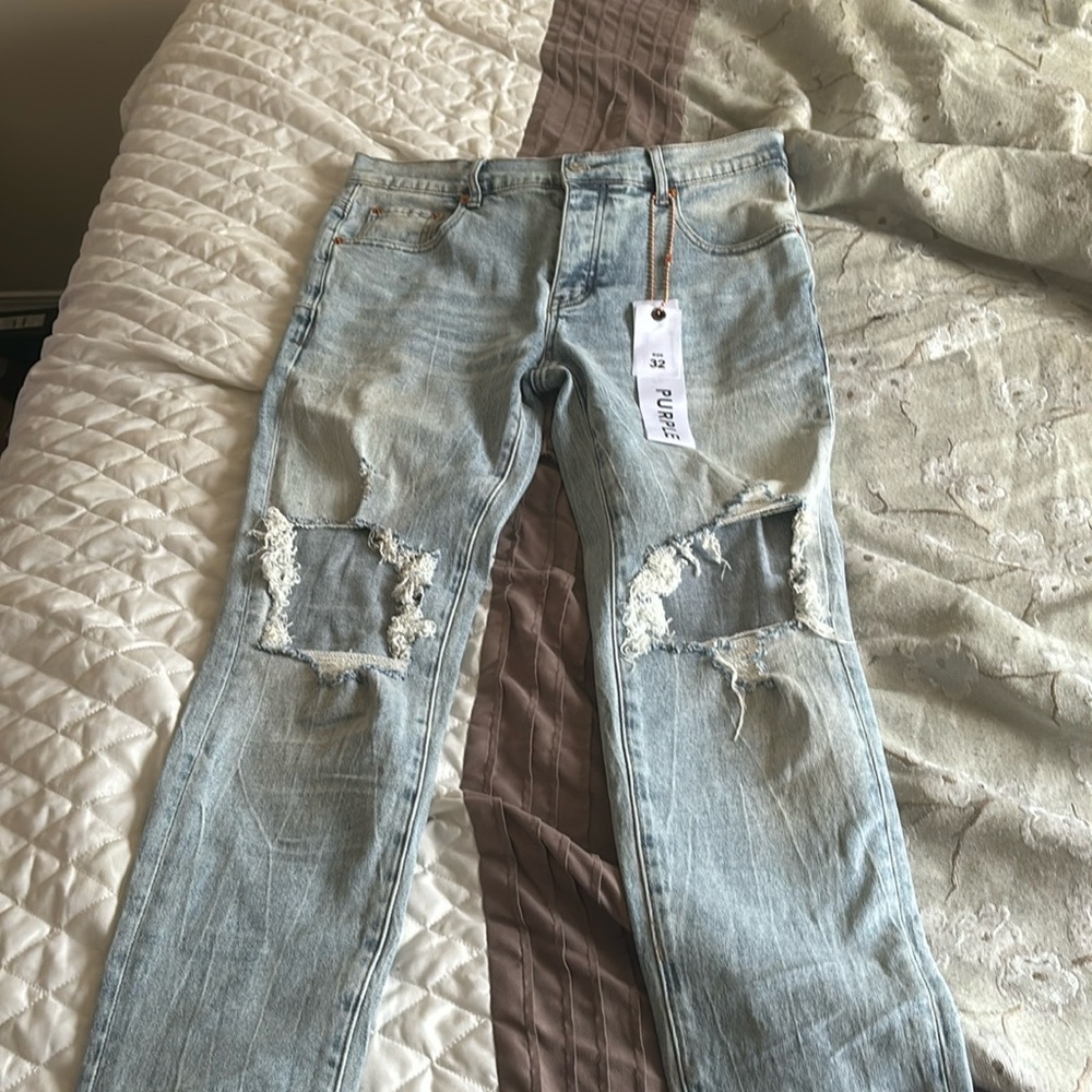 P002 Light Indigo Blowout. Size 32